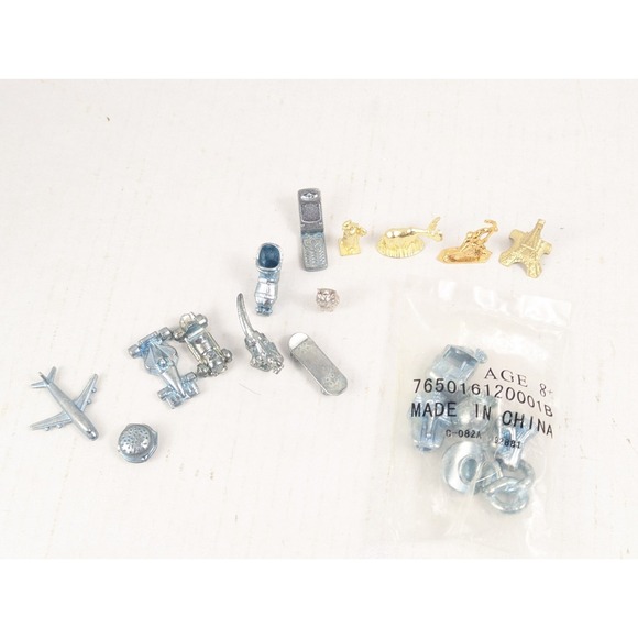 Lot of Pewter Monopoly Tokens – Hockey, Cheaters, World Edition, Here & Now, Dis - Picture 1 of 8